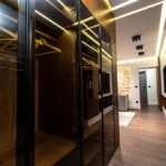 Wood storage closet with integrated shelving